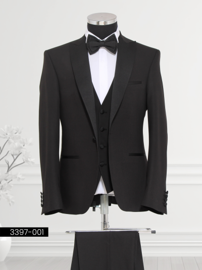 Classic black tuxedo featuring a satin shawl lapel, single-breasted waistcoat, tailored trousers, and bow tie displayed on a mannequin