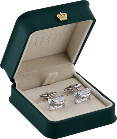 Elegant silver and diamond cufflinks in a green velvet box with a gold crown emblem, perfect for formal occasions.