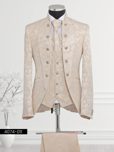 Beige Floral Patterned Suit featuring a satin shawl lapel, patterned waistcoat, tailored trousers, and satin cravat displayed on a mannequin