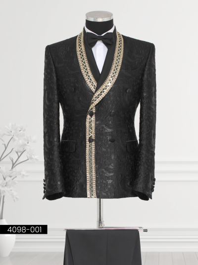 Black double-breasted tuxedo for men with gold geometric trim on satin shawl lapel and jacket edges.