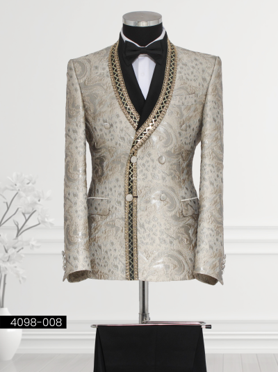 Gold brocade double-breasted suit for men with black geometric trim on satin shawl lapel and intricate paisley patterns.