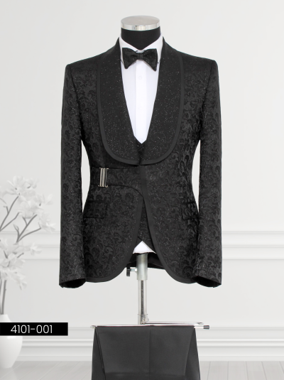 Black Embossed Tuxedo featuring a wide shawl lapel, matching waistcoat, tailored trousers, and bow tie displayed on a mannequin