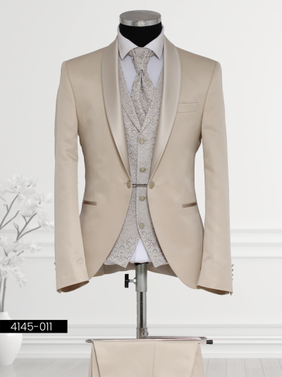 Beige tuxedo suit with satin lapel and paisley-patterned vest for formal events.