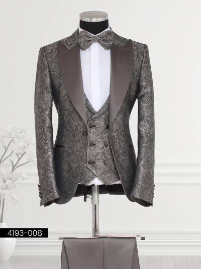 Men’s charcoal gray suit with brocade tuxedo jacket, matching waistcoat, and bow tie—perfect for formal events.