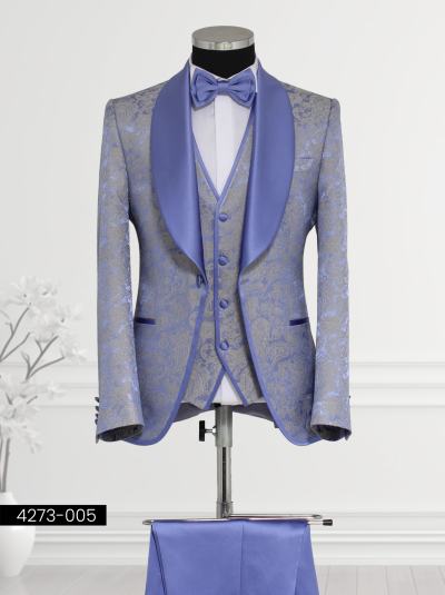 Men’s purple and gold suit with satin lapels, paisley vest, and bow tie—ideal for formal events.