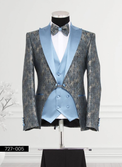 Elegant blue and gold tuxedo with satin lapels, displayed on a mannequin.