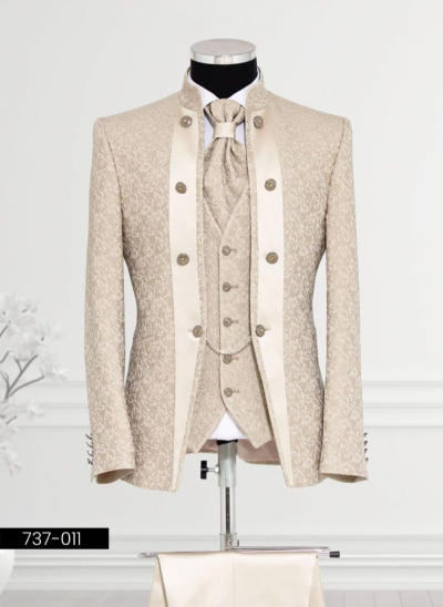 Luxurious cream suit featuring brocade texture, mandarin collar, double-breasted waistcoat, and satin accents—ideal for weddings and formal gatherings