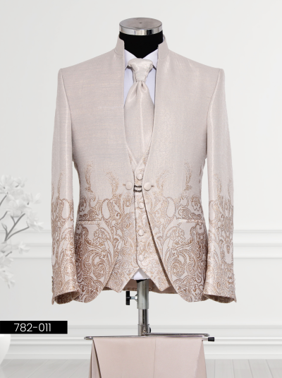 Vagant's Ivory Embroidered Suit with intricate gold embroidery and mandarin collar.
