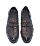 Brown luxury leather shoes with crocodile skin texture and metallic 'V' emblem.
