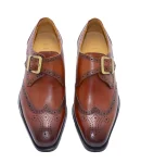 Elegant brown leather monk strap shoes with brogue detailing, ideal for business, formal, and semi-formal occasions.