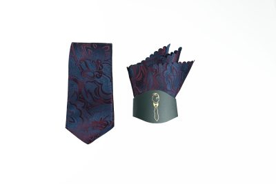 Floral necktie and matching pocket square set with paisley patterns in blue, burgundy, and purple.