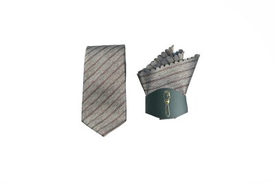 Necktie and pocket square set with matching diagonal gray and reddish-brown stripes, elegantly wrapped in a green band with a gold logo.