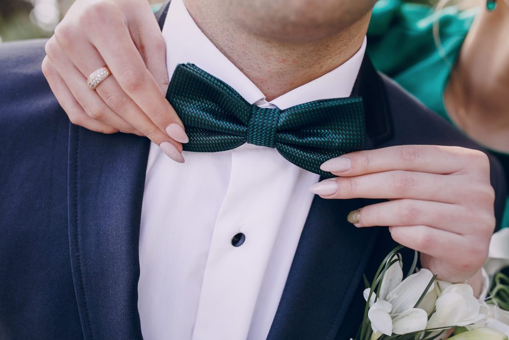 Wife adjusting her husband's Bow Tie