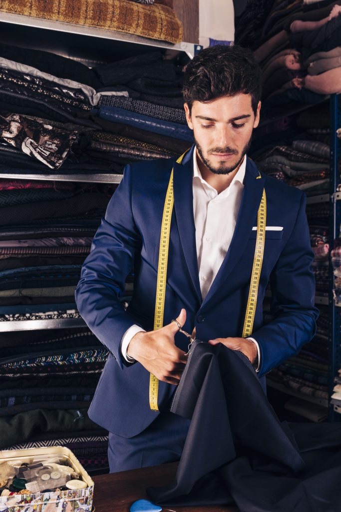 Tailor is making a Bespoke suit for client
